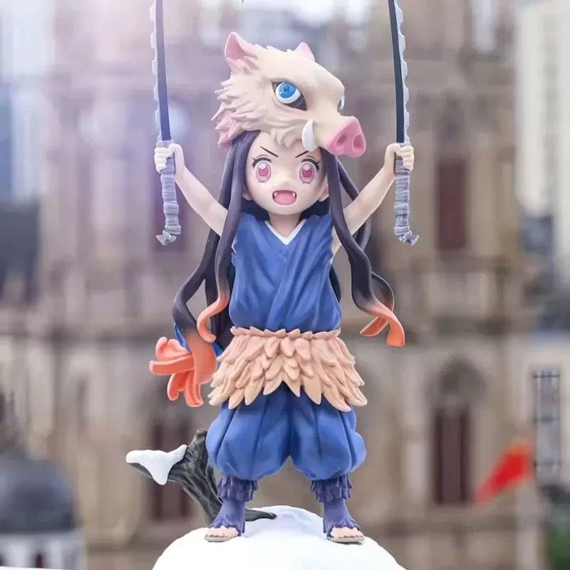Anime character figurine on a swing with a blurred background