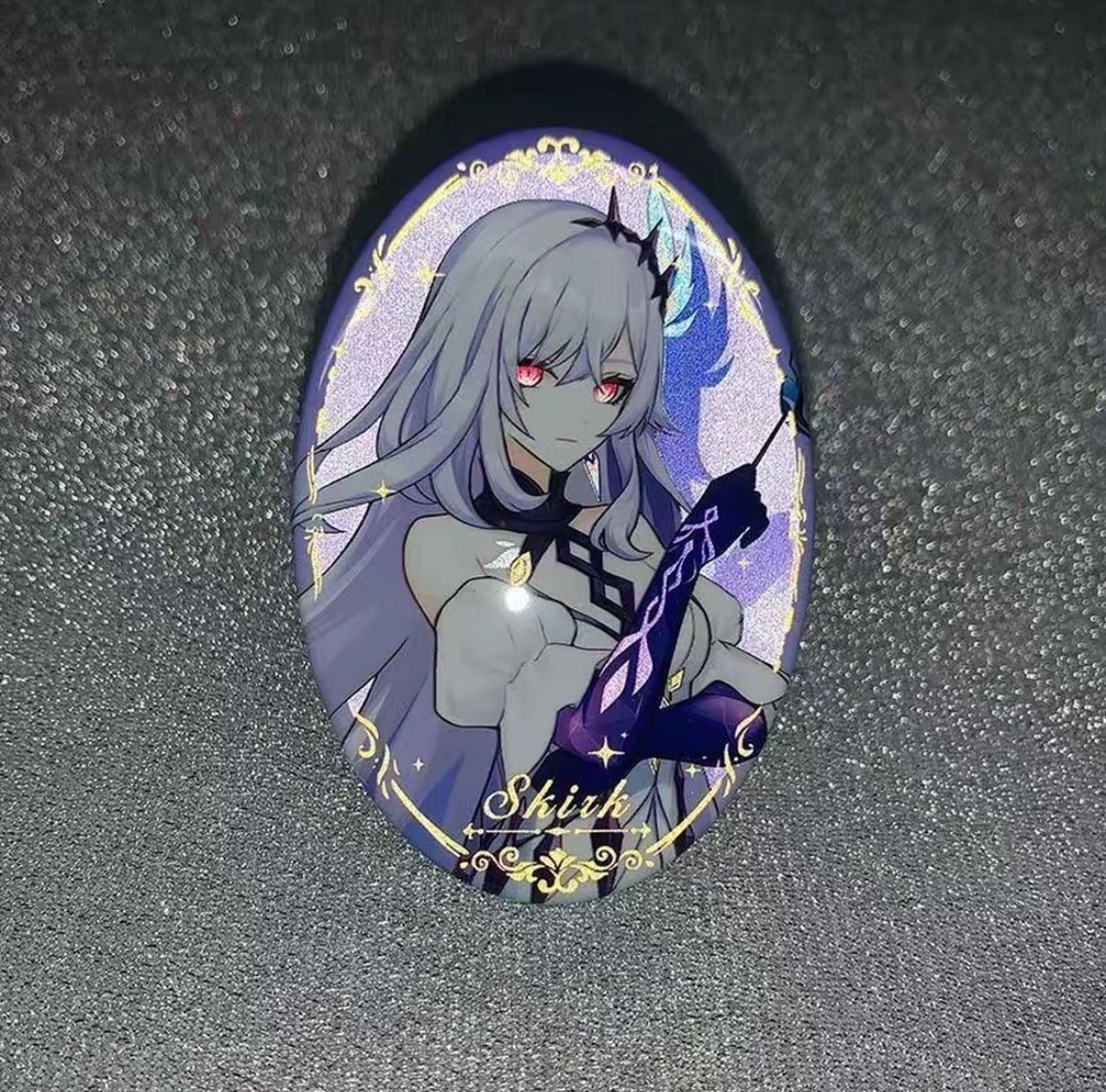 Cabinet keychain with anime-style character on a dark background