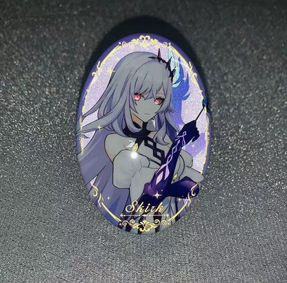 Cabinet keychain with anime-style character on a dark background