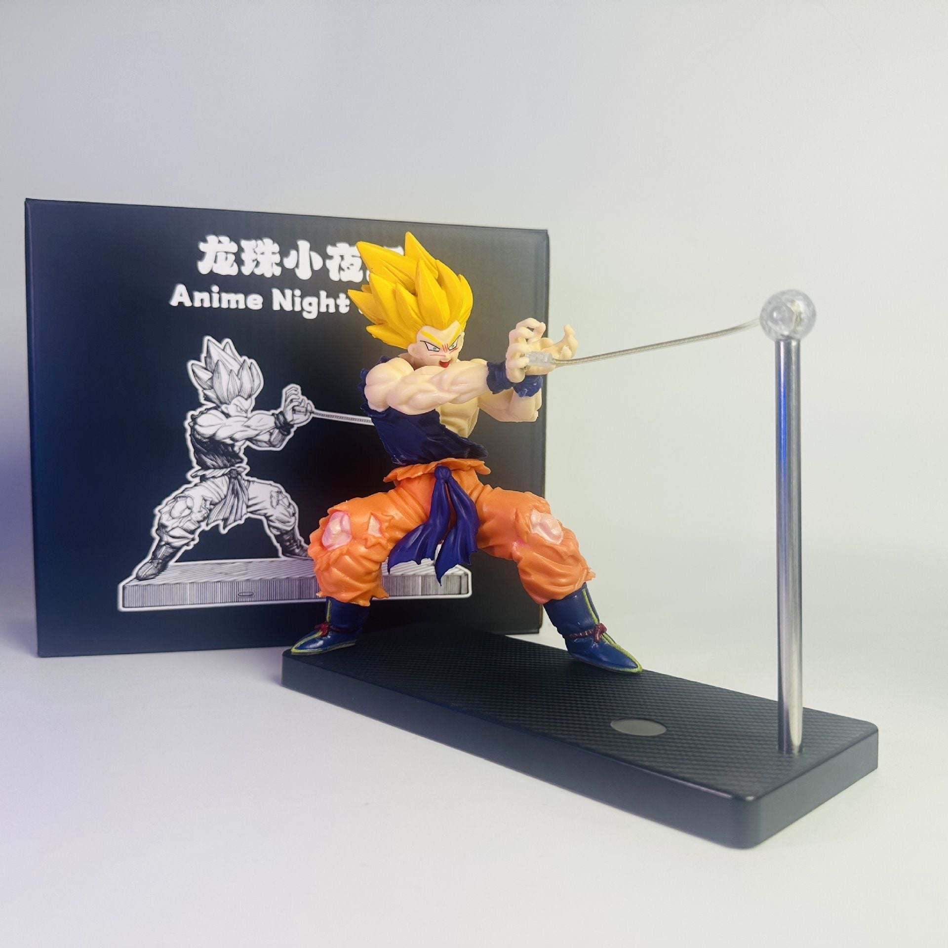 Action figure on a stand with promotional material in the background